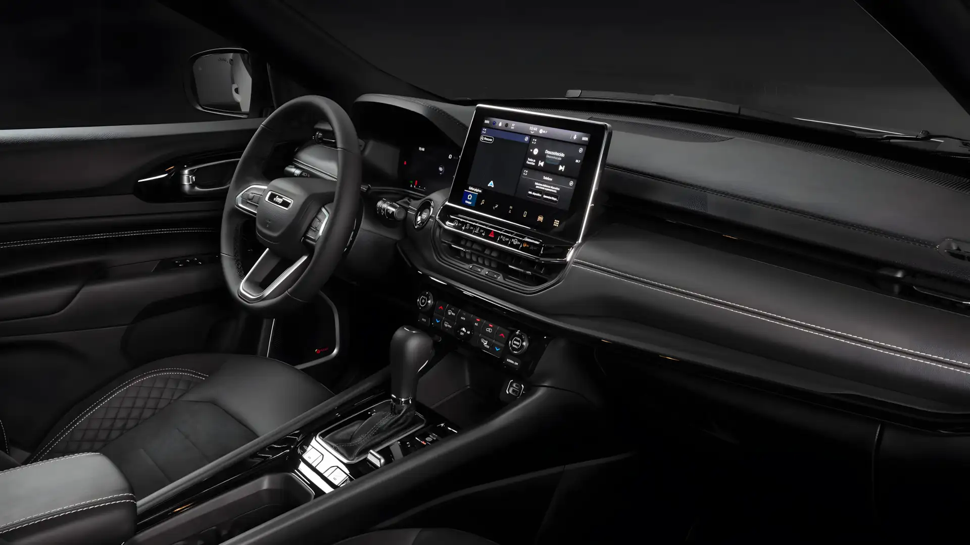 Interior do Jeep Compass Blackhawk Flex 2026 com painel digital e central multim&iacute;dia