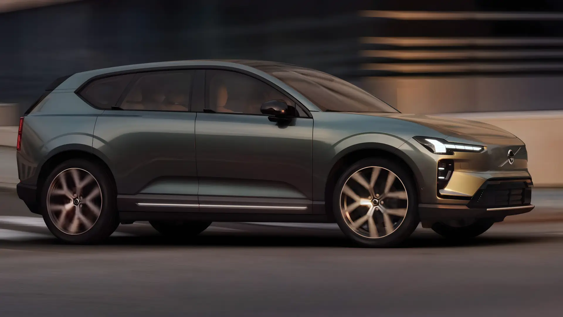 Volvo EX60 2026 em vista frontal e lateral mostrando design aerodinâmico